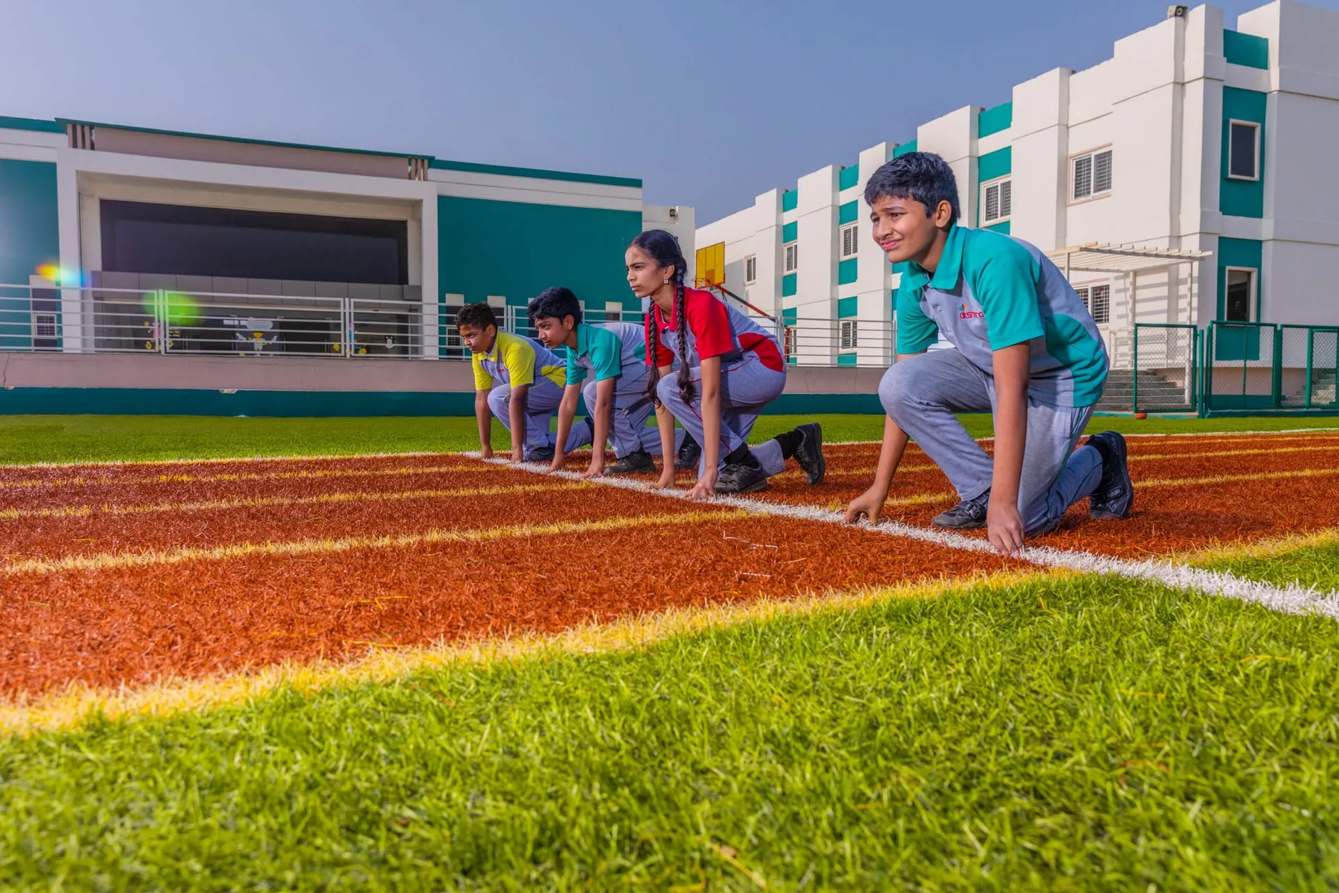 Students training on the athletics track